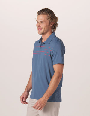 Fore Stripe Performance Polo in Mineral Blue On Model from Side