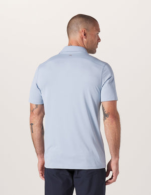 Normal Script Performance Polo in Blue Fog On Model from Back
