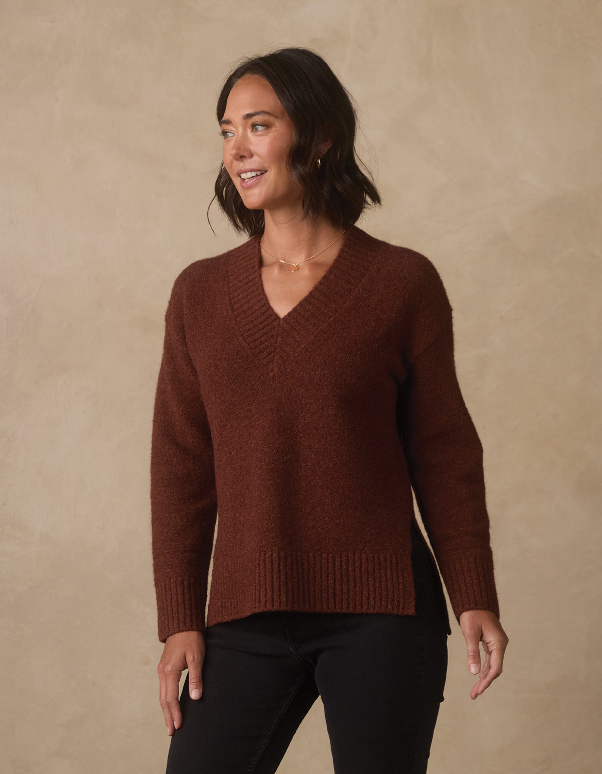 Homebound V-Neck Sweater in Spiced Brandy — front view on model