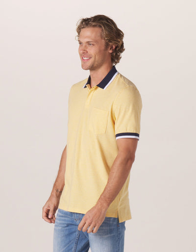Active Puremeso Tipped Polo in Golden Hour On Model from Side