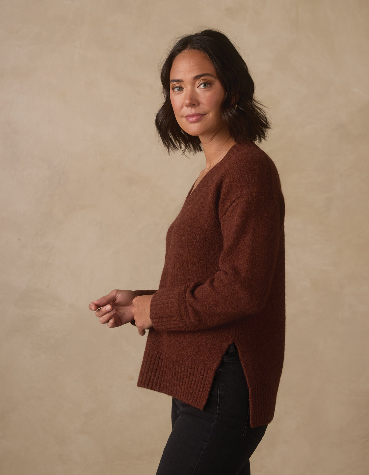 Homebound V-Neck Sweater in Spiced Brandy — side view on model