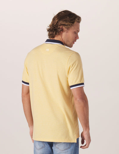 Active Puremeso Tipped Polo in Golden Hour On Model from Back