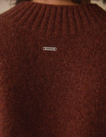 Homebound V-Neck Sweater in Spiced Brandy — knit and tag detail