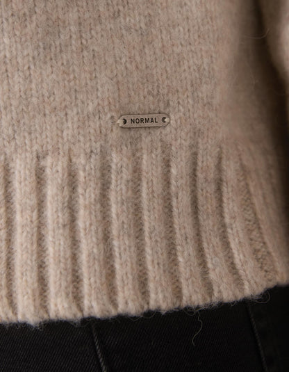 Astrid Fair Isle Sweater in Port Wine Multi — hem and tag detail