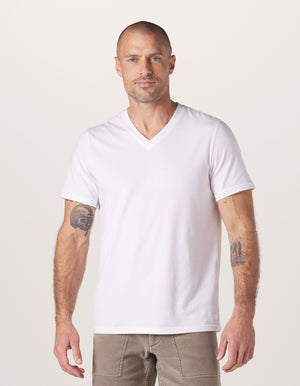 Active Puremeso V Neck Tee in White On Model from Front