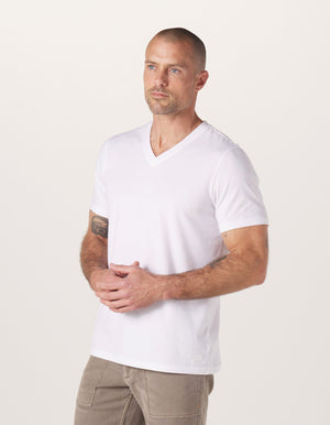 Active Puremeso V Neck Tee in White On Model from Side