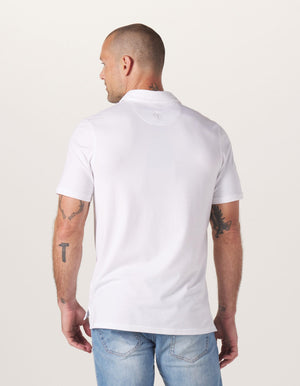 Active Puremeso Polo in White On Model from Back