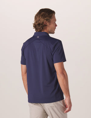 Cross-Back Seamed Performance Polo in Navy On Model from Back