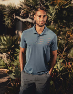 Fore Stripe Performance Polo in Mineral Blue On Model outside