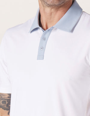 Color Block Performance Polo in White/Blue Fog On Model Collar Detail